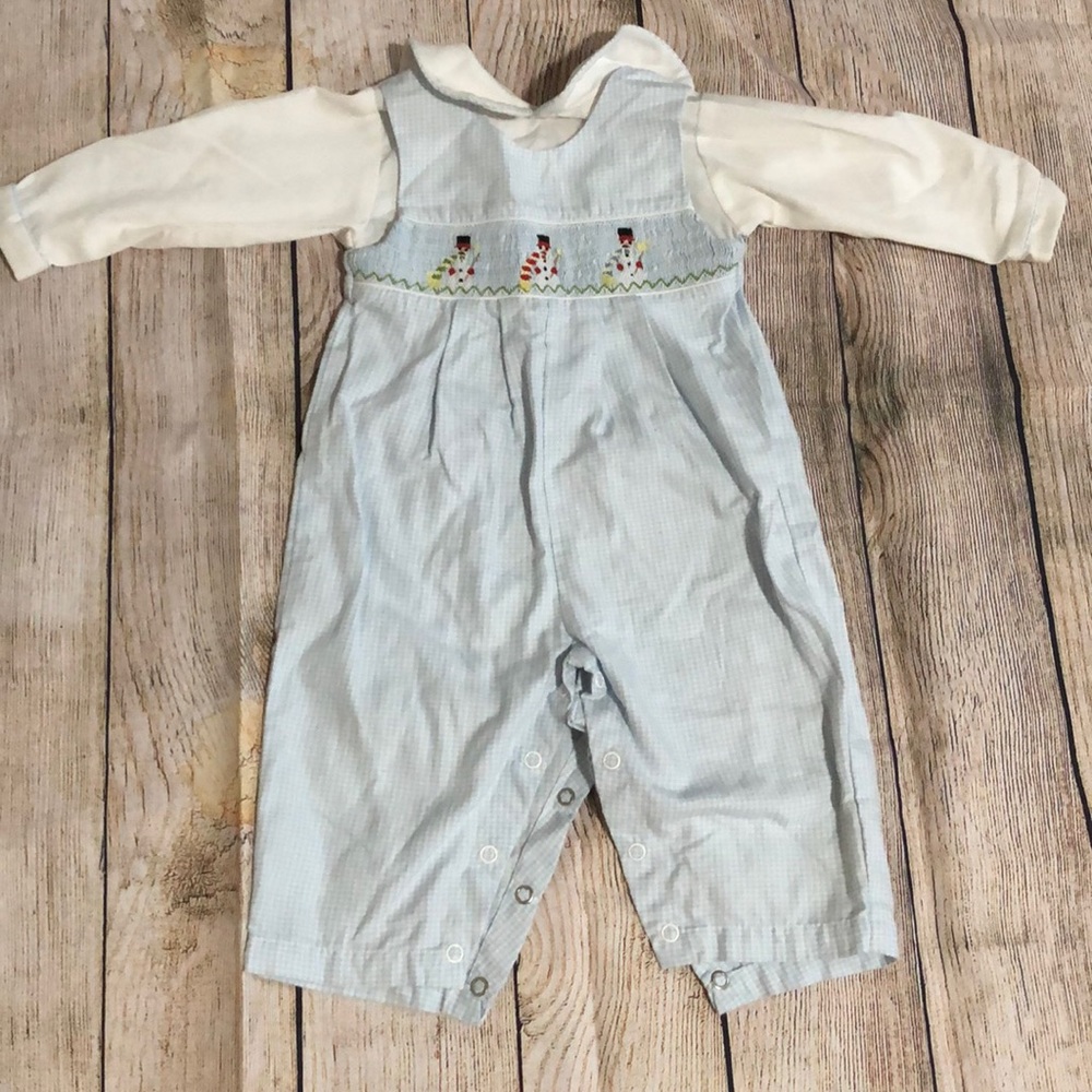 Used, play condition sweet snowman smocked Petit Ami longall romper.